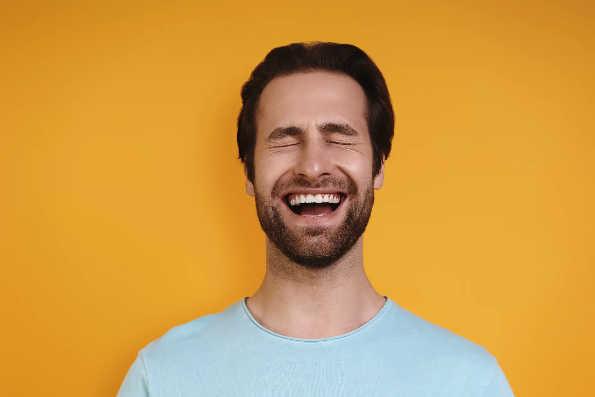 portrait of happy young man in casual clothing kee utc